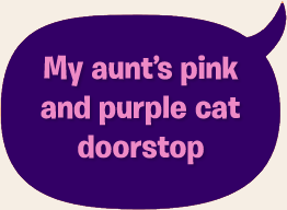 My aunt's pink and purple cat doorstop